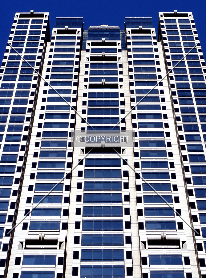 Looking up at facade detail of upper floors