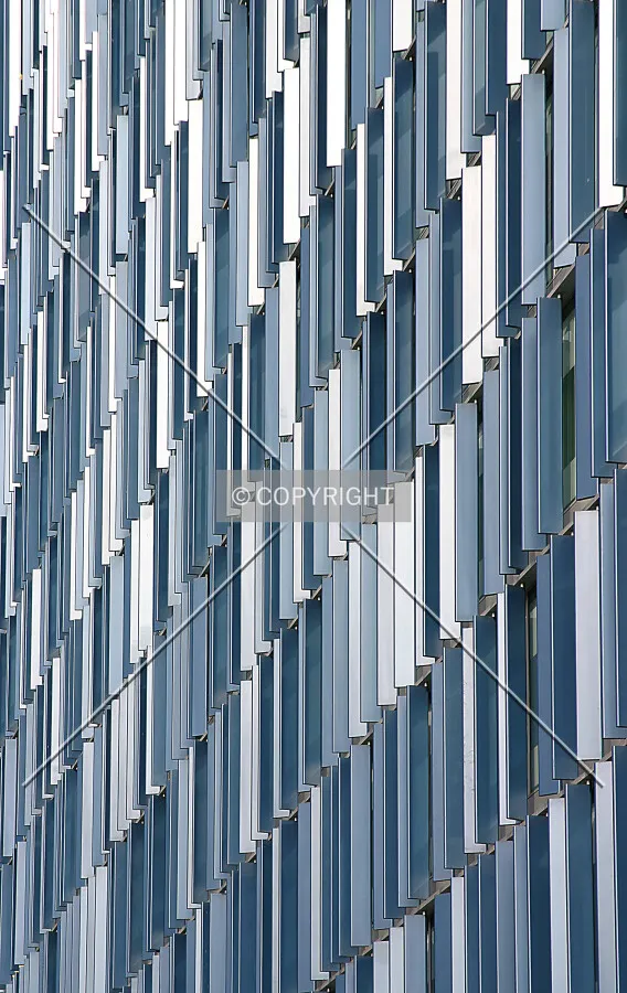 The blue-finned façade on the west side