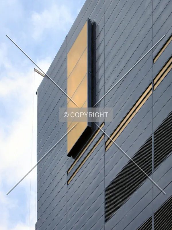 The yellow window on the tallest section