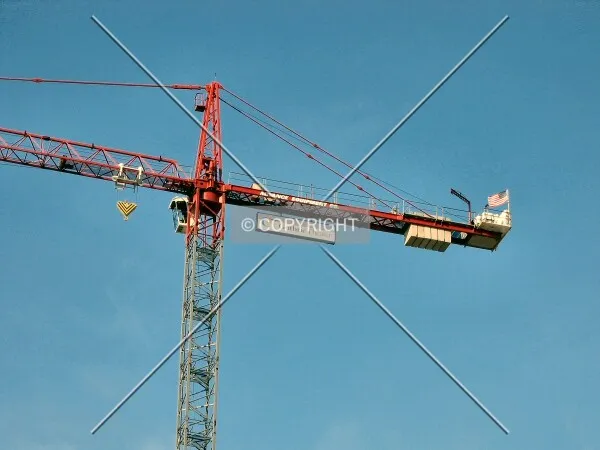 One of the tower cranes, with the Guthrie Logo