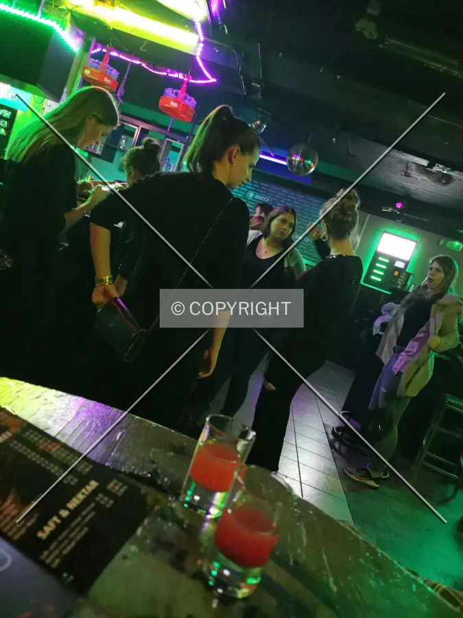 People having a good time in a bar