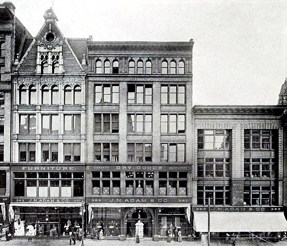 Vintage view from the west showing Green & Wicks buildings from 1891 and 1895