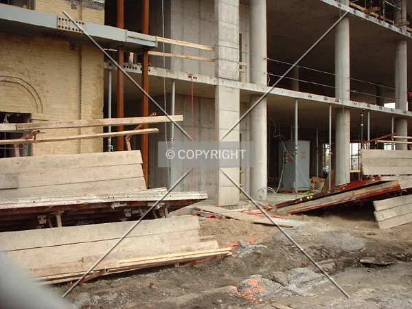 Base of the new building (right) against the old Washburn-Crosby Mill (left)