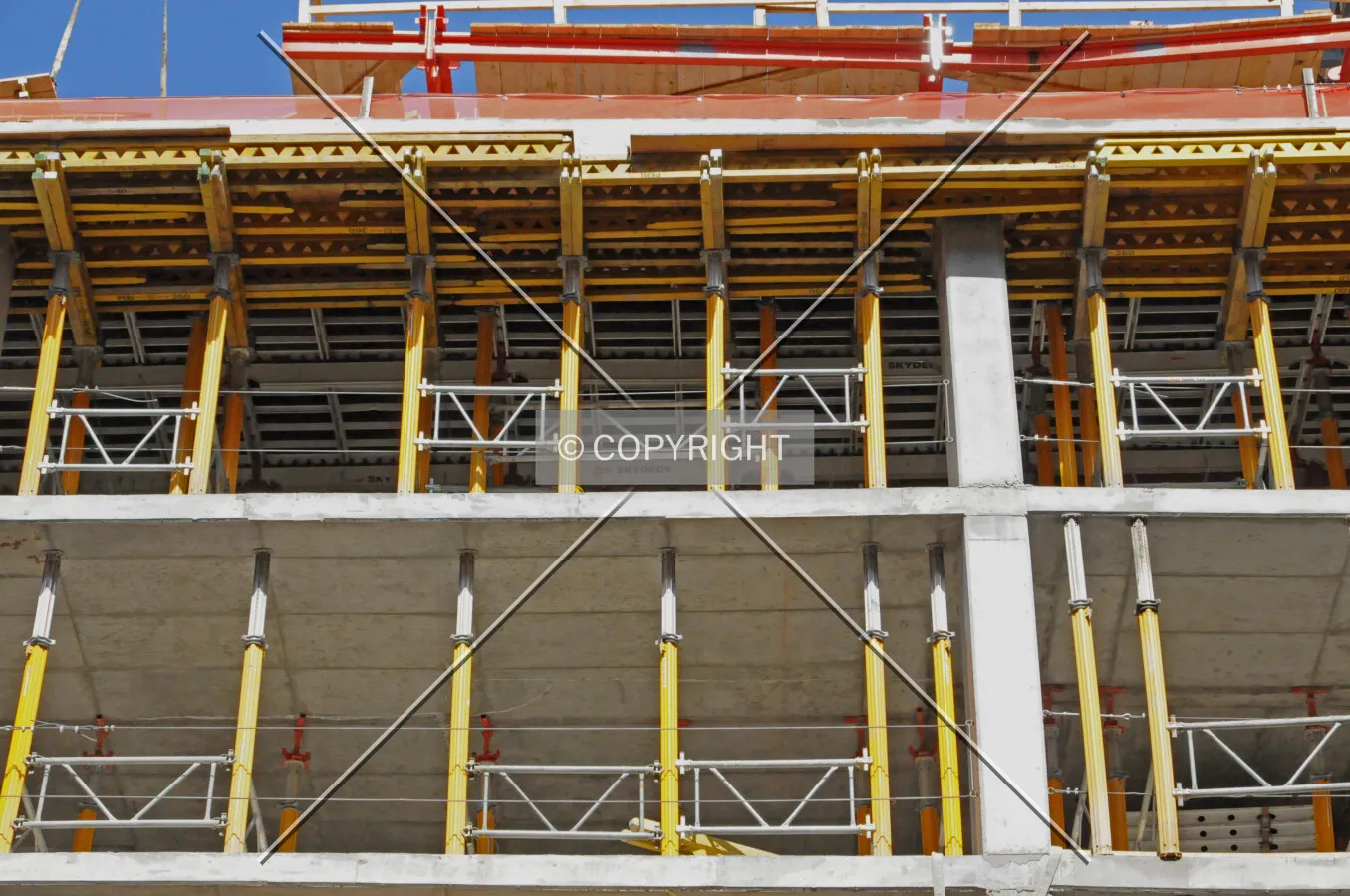 Scaffolding and pole shores on the southern edge of the structure