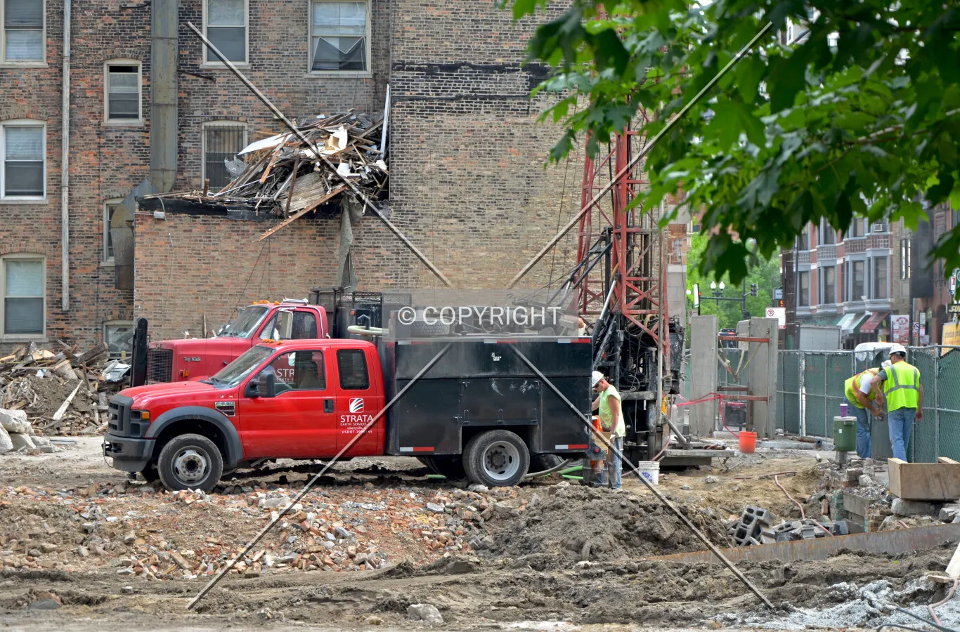 Pre-construction soil test borings drilled through the ruble of recently demolished buildings along State Street, looking south from Chestnut Street. June 27, 2013