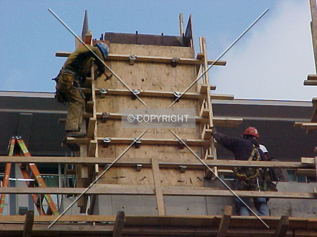 Construction workers working on the formwork