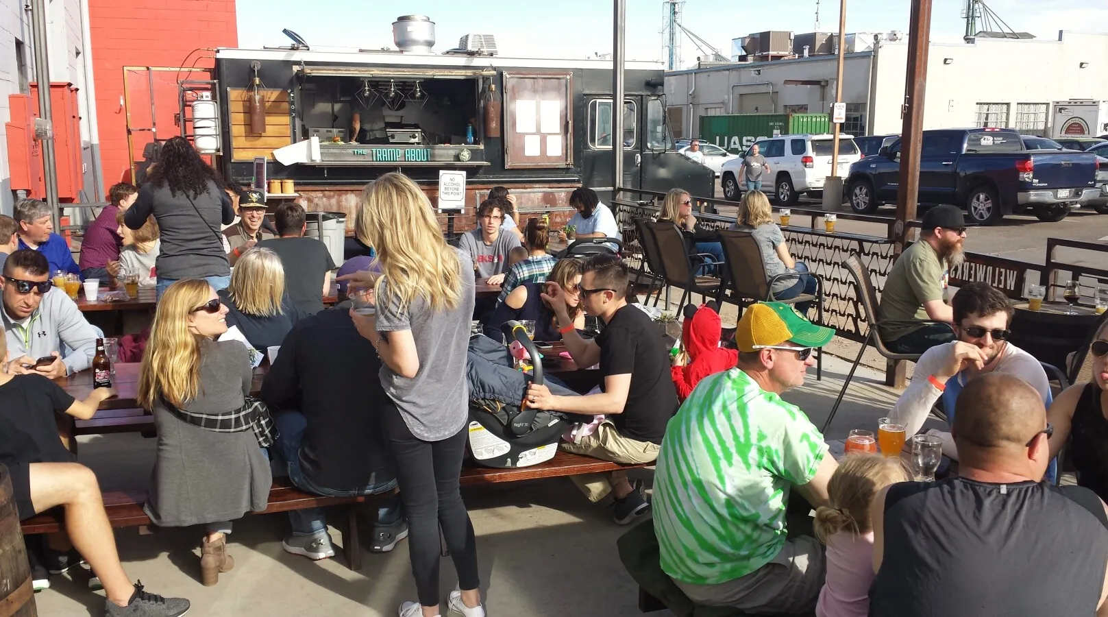 People enjoying beer on the patio