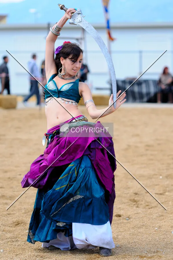 Woman dancing with a sword