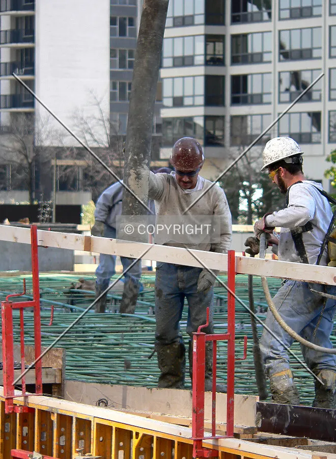 Spreading concrete across the deck