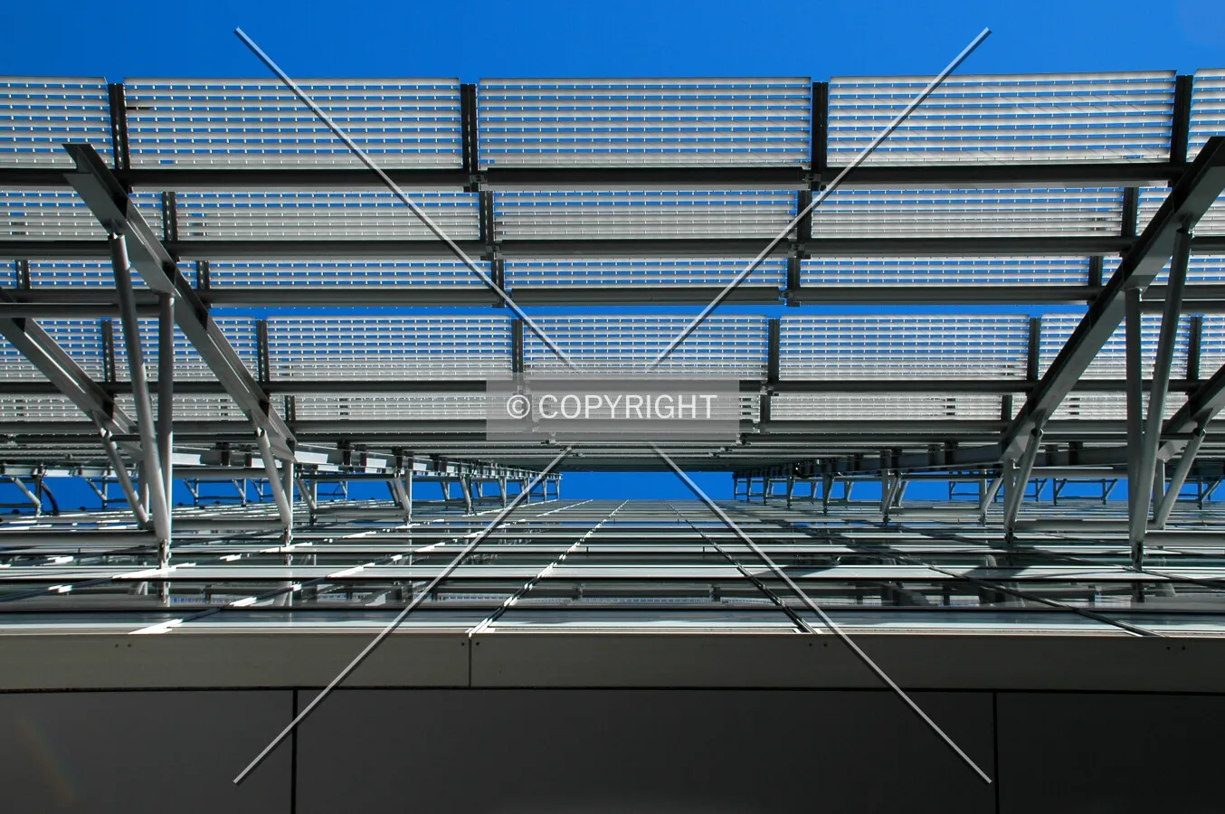 Looking up between the facade and sunshades