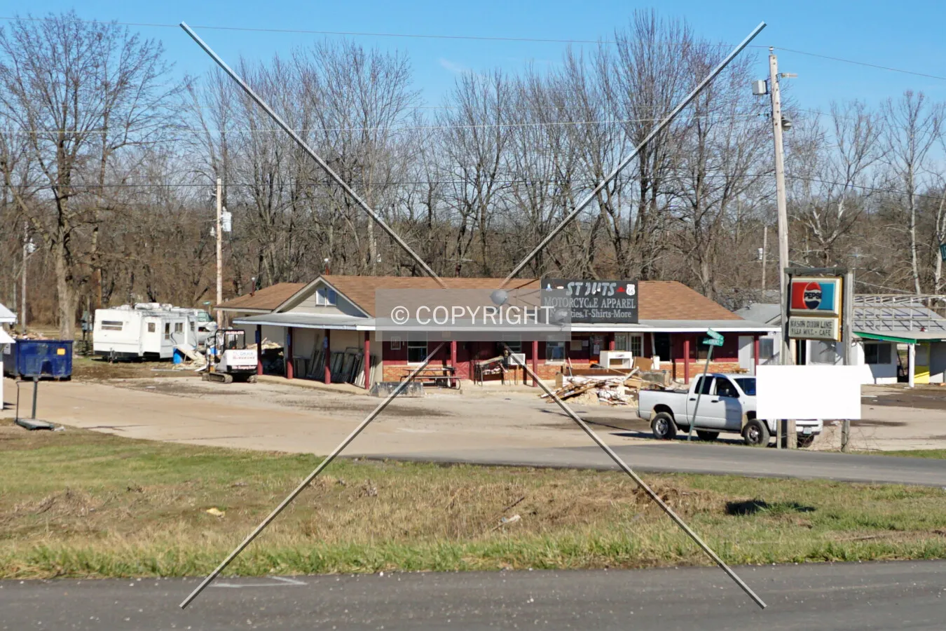 View from the south while workers clean up from flood damage; January 5, 2016