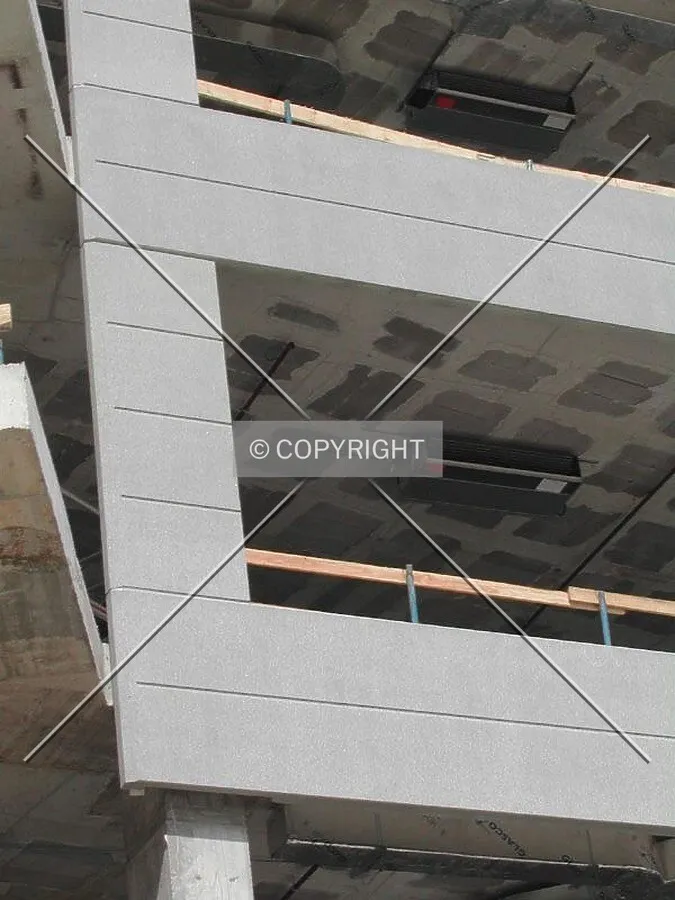 Close view of the building, some equipement is being placed