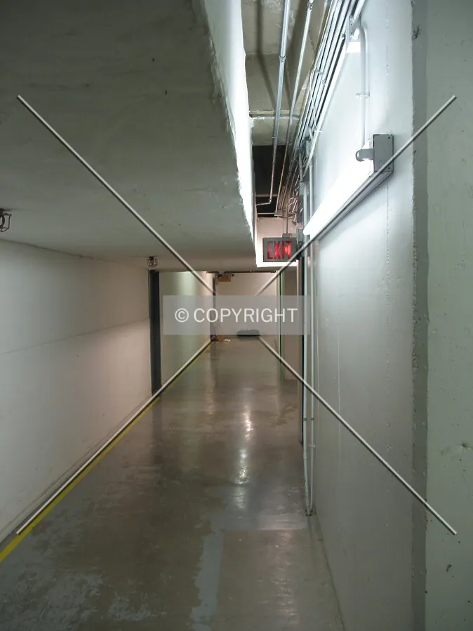 Basement corridor leading to the loading docks