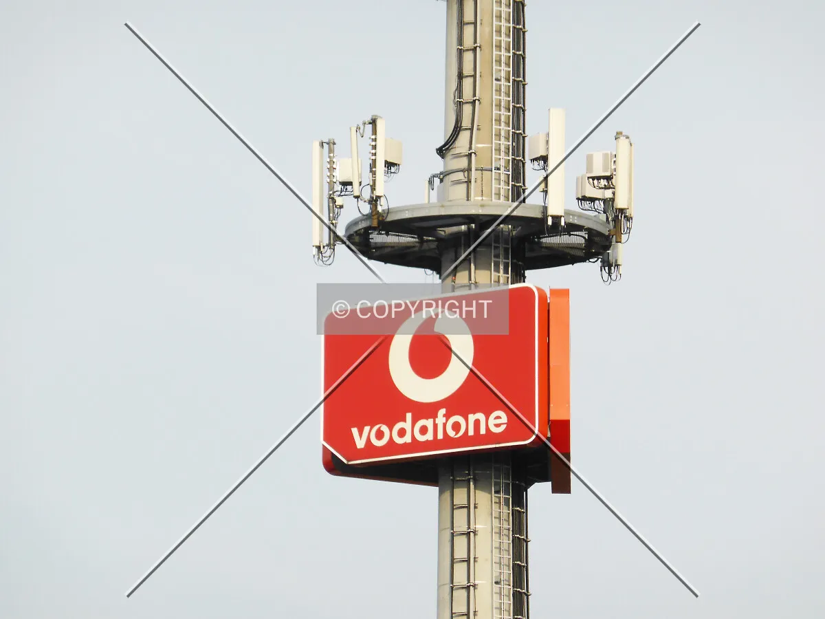 vodafone logo at a mobile phone communication mast