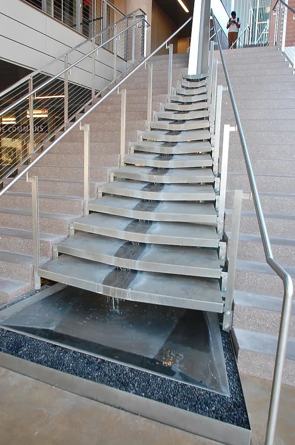 Water cascading down between the stairs