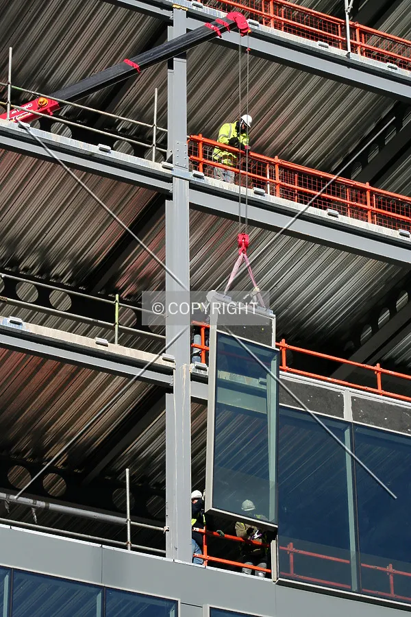 Facade panel being fitted