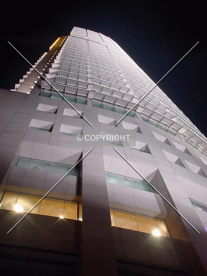 Eastern facade of tower illuminated at night