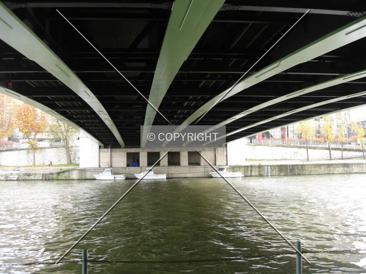 Under the bridge which is spanning the river Seine