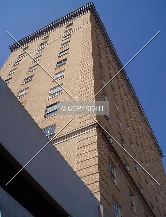 The northeast corner from below on Twohig St