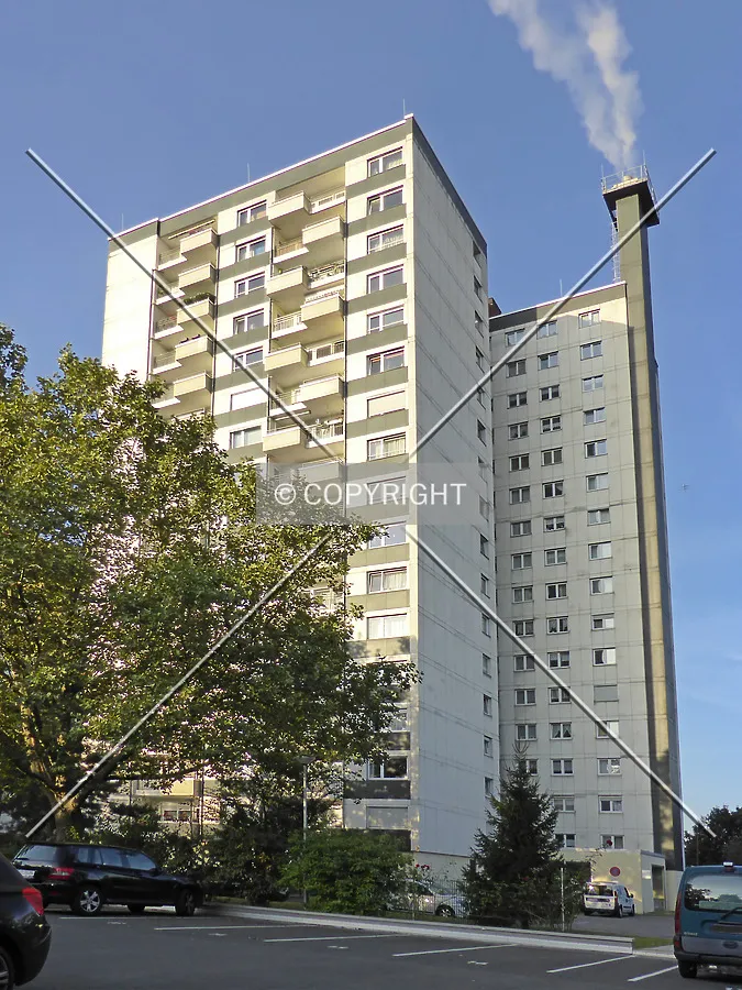 Smokestack attached to the high-rise building