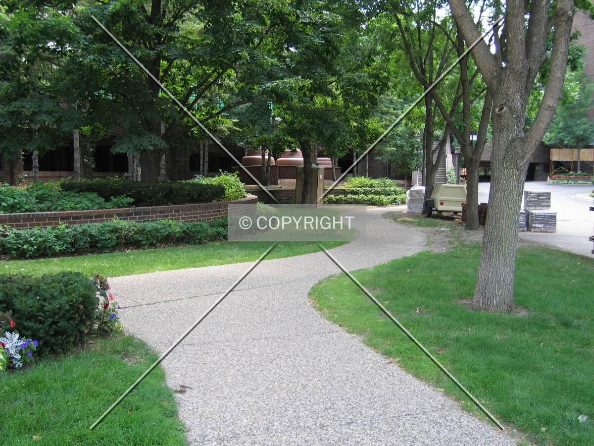 Winding sidewalk off the tower's southwest side