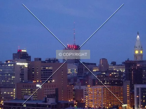 Aramark Tower, Loews Philadelphia Hotel (center), and City Hall from the northwest at dusk