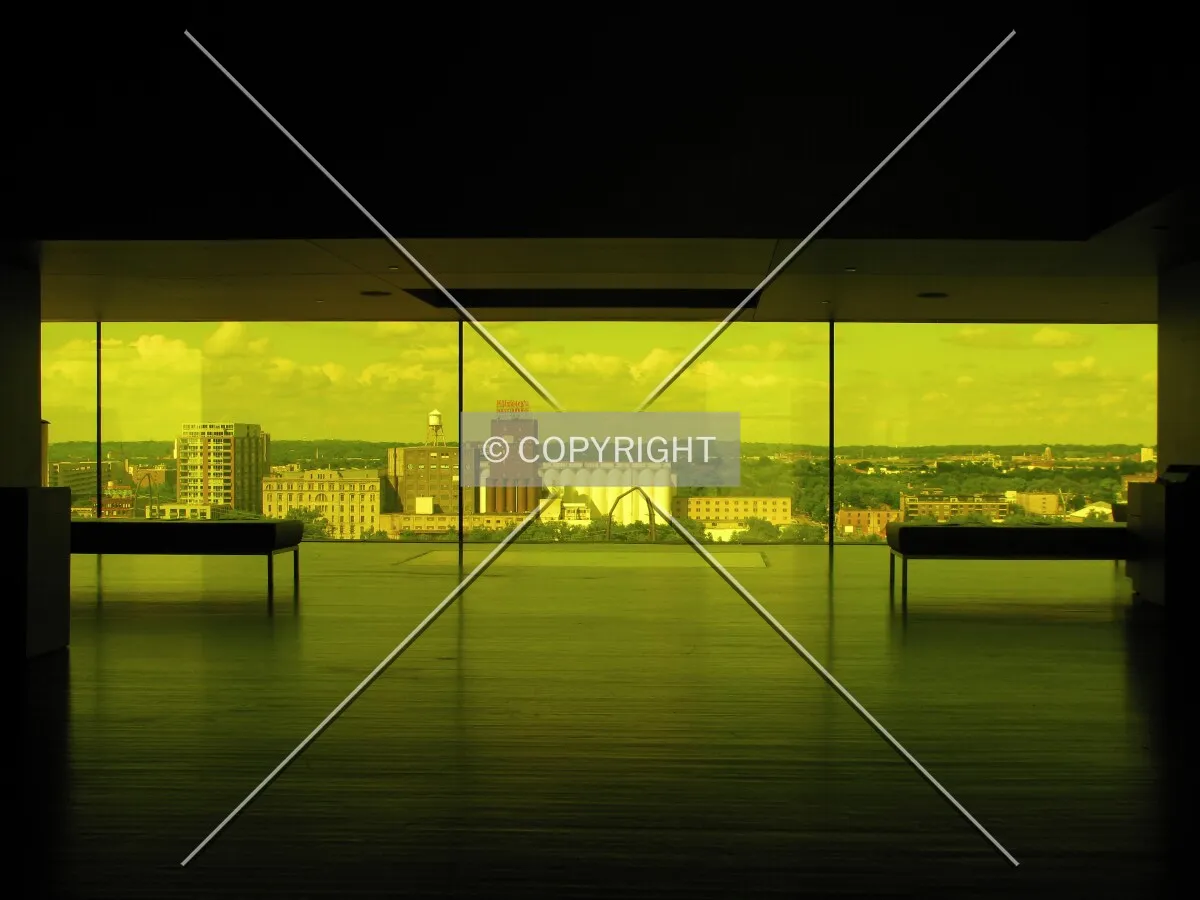 An empty Amber Box Lobby, with the view across the Mississippi River to the East Bank Milling District