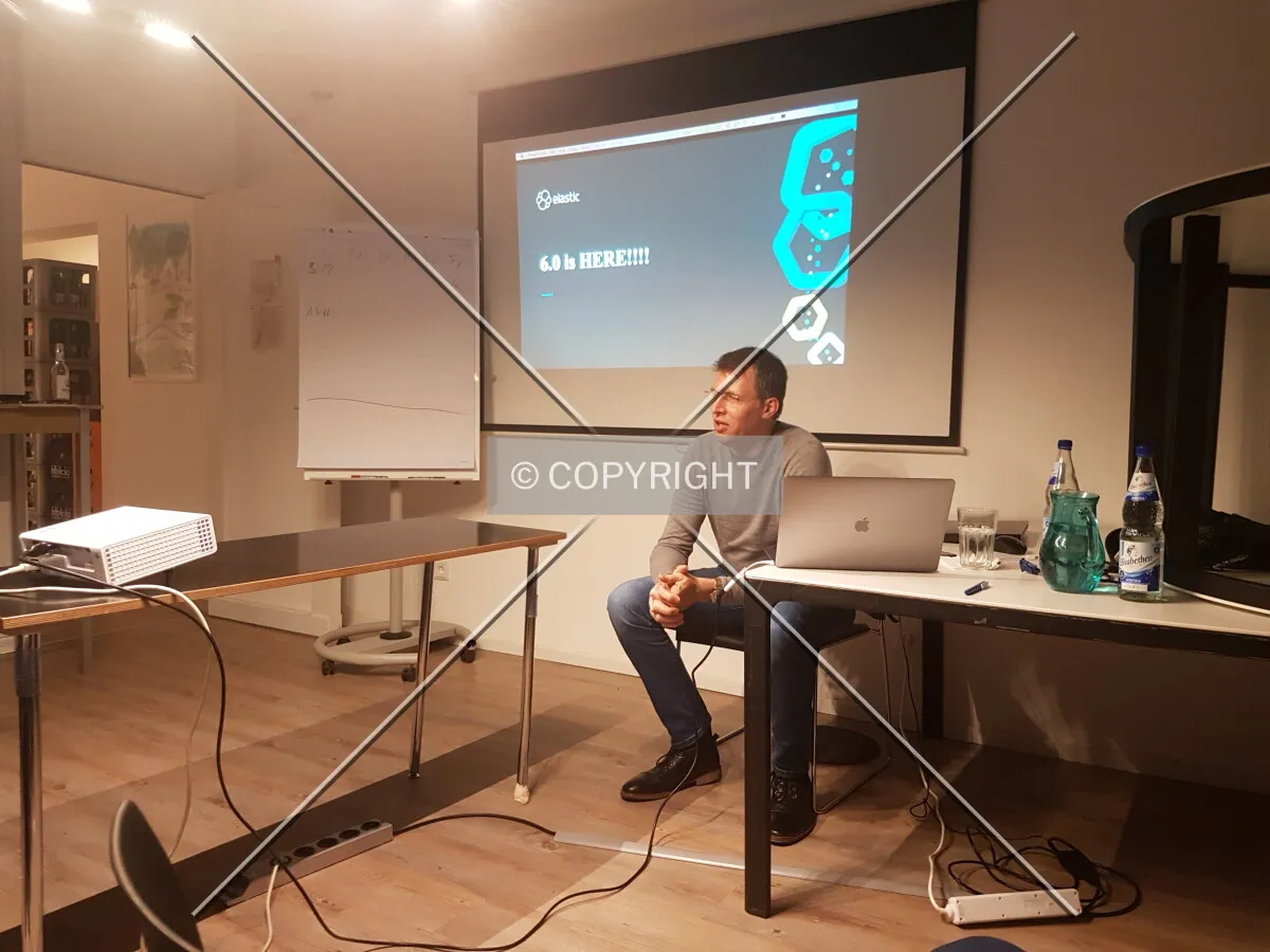A man is presenting a slideshow