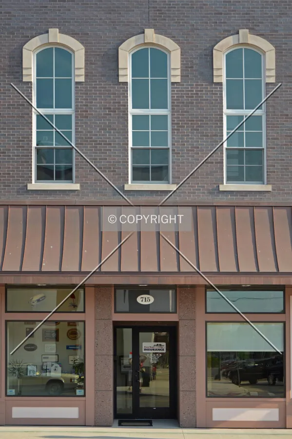 Midsection of the renovated front facade. July 9, 2013.