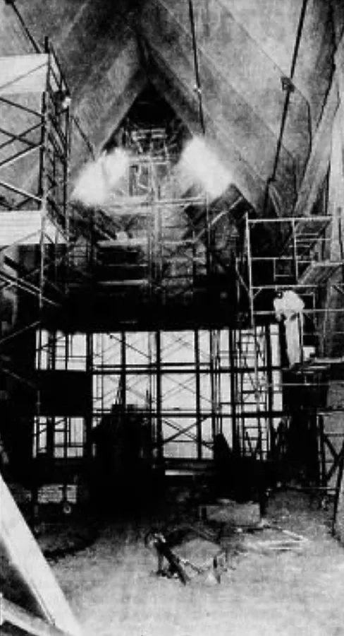 Workers finishing construction on the upper floors; November 13, 1988