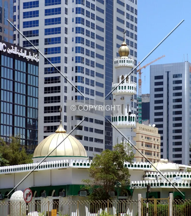 Mosque and skyscrapers