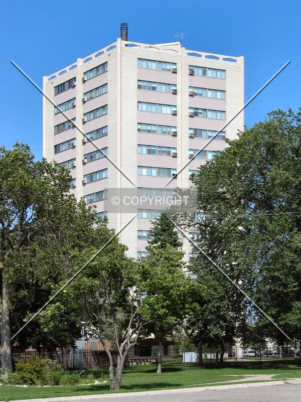 View from the southwest, rising over trees