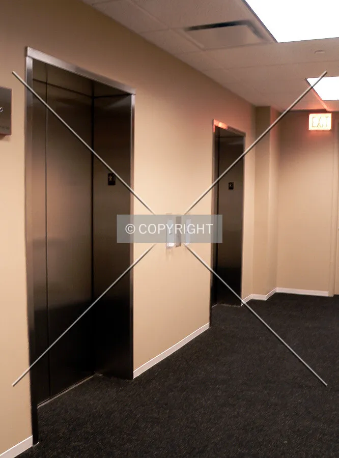Elevator lobby within the parking structure