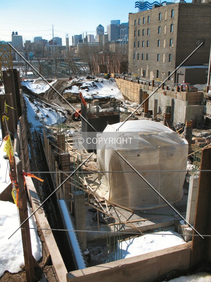 View into the pit from 2nd Street & 3rd Avenue SE
