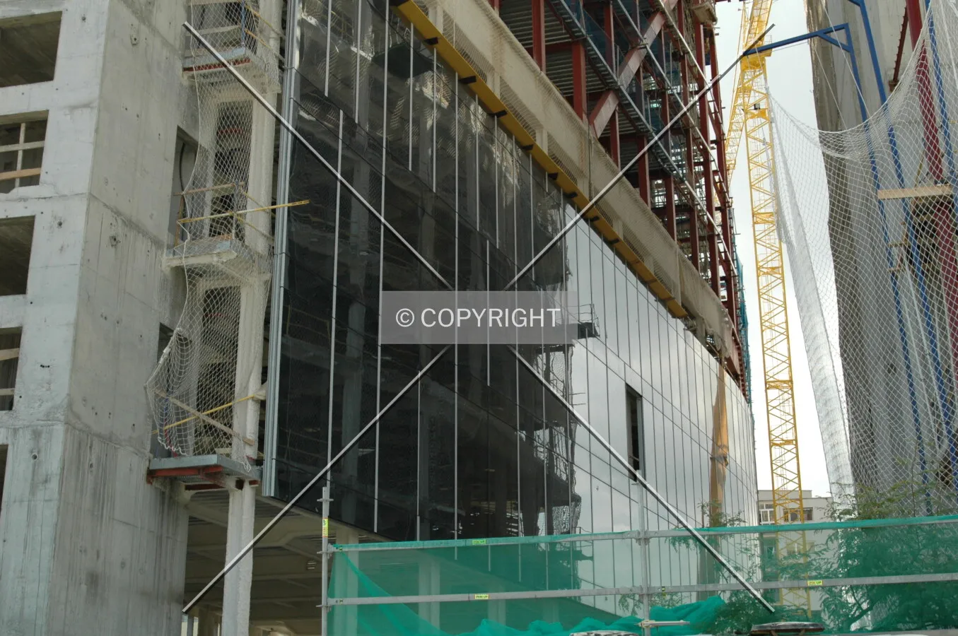 Glass facade in the space between the towers