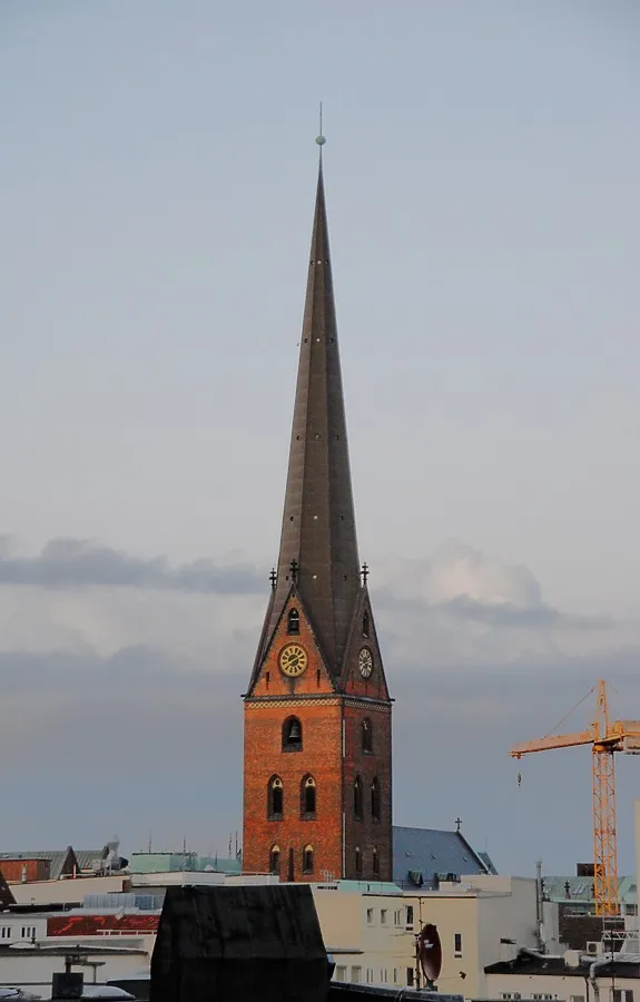 Church spire rising above the rooftops