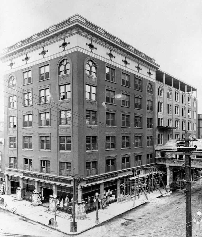 Vintage view from the north, showing construction of the 1913 wing and bridge to the Post Tavern