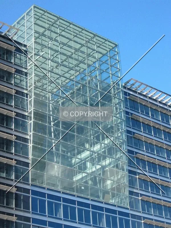 Focused view on the large glass atrium facing Montgomery Square