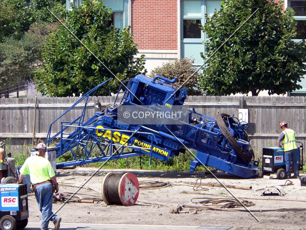Caisson motor waiting to be installed on a crane