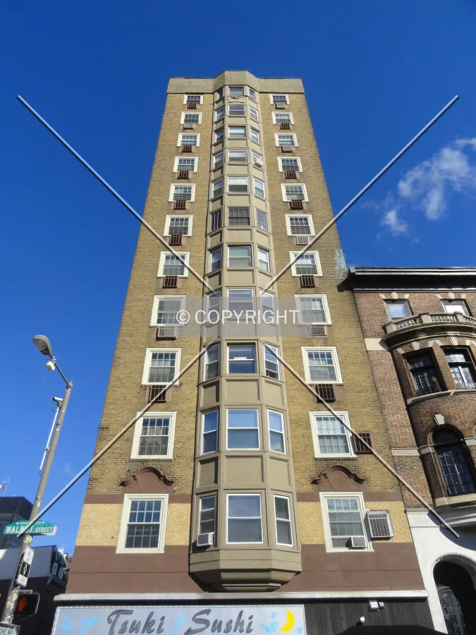 Looking up the Walnut Street facade