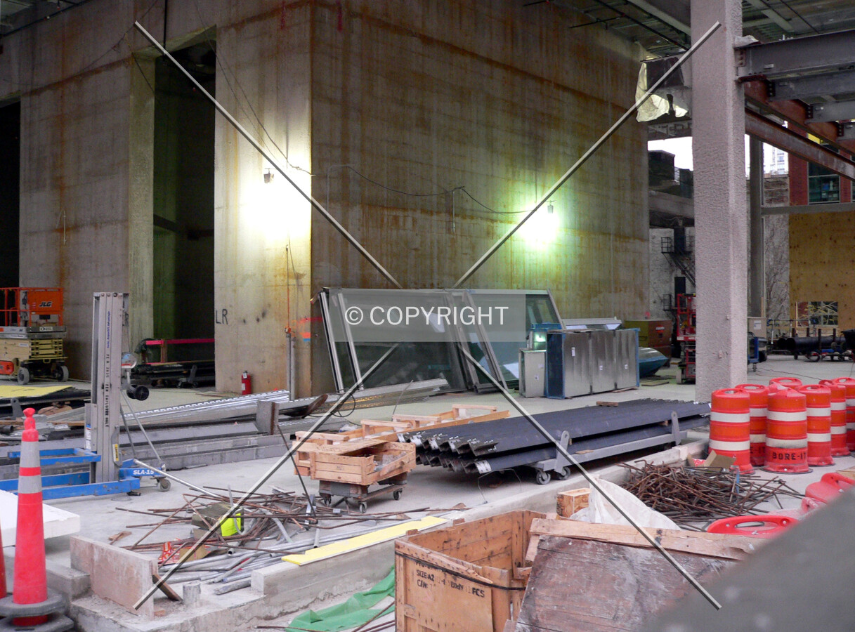 View into the structure from LaSalle Street with building materials visible