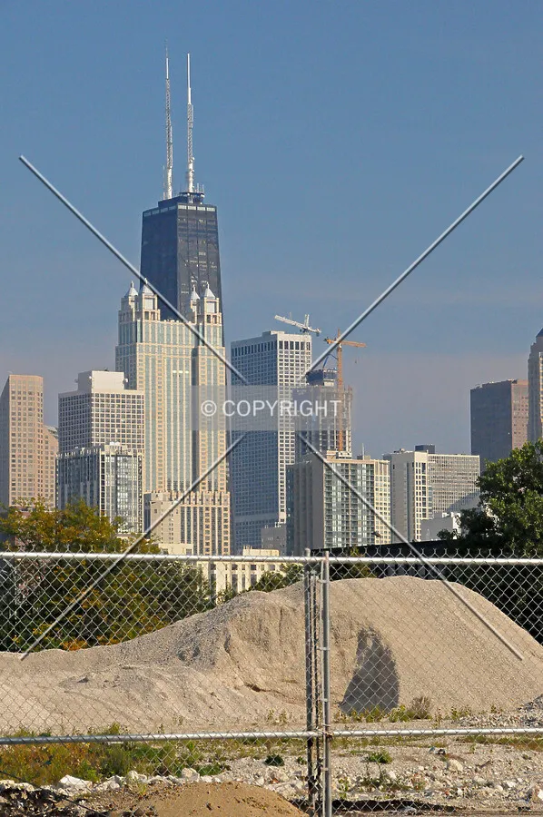 View southeast from Halsted Street with the site of the recently demolished New City YMCA in the foreground