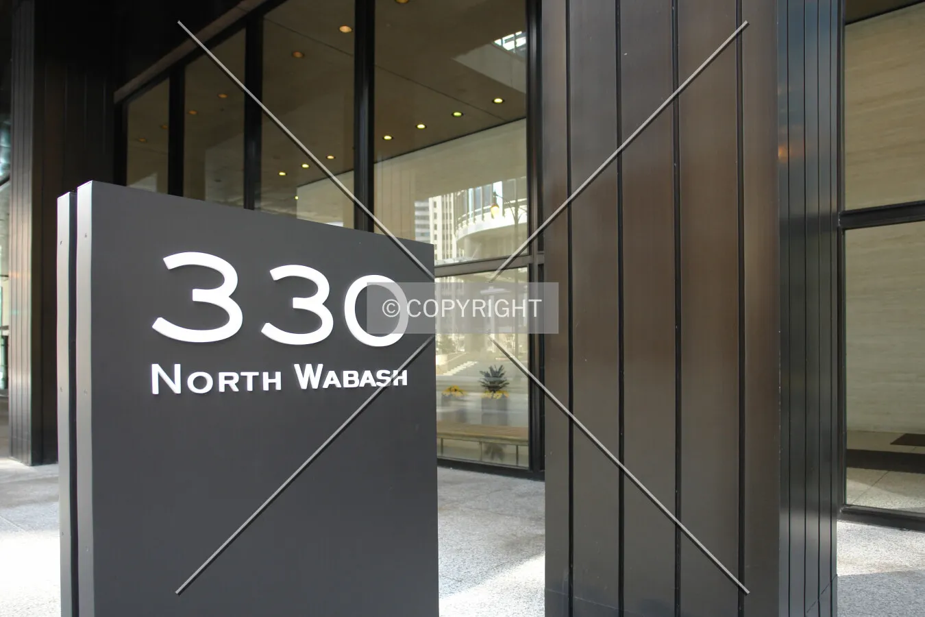 Brown column and address sign of 330 North Wabash in Chicago