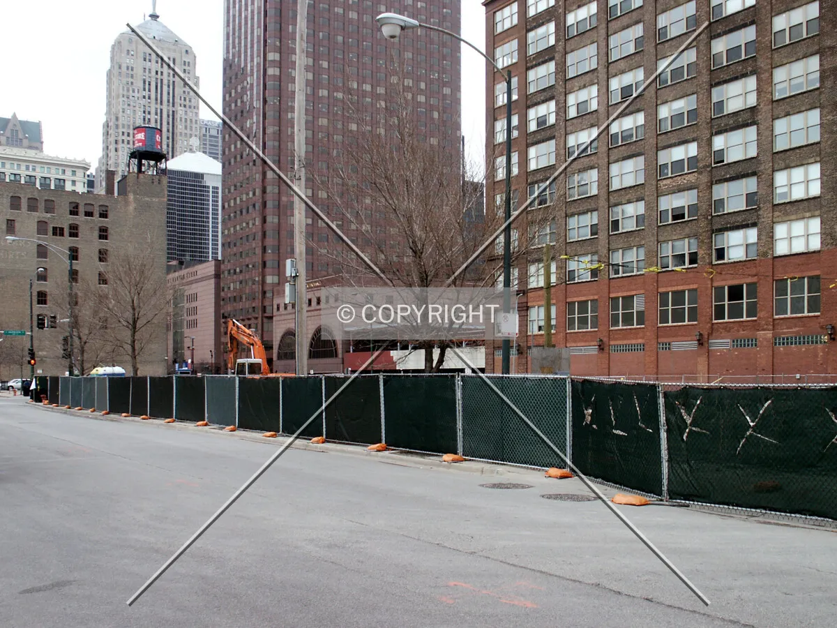 Site fence on Wells Street