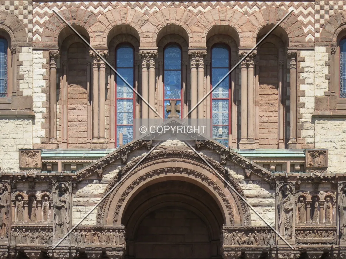 Facade and window detail above the main entrance