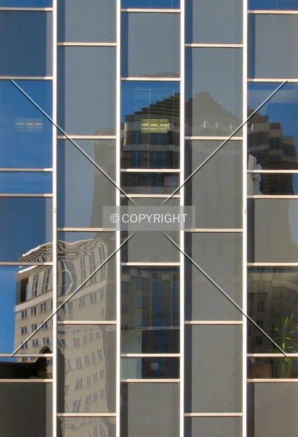 2nd Avenue South windows reflecting the Accenture Tower