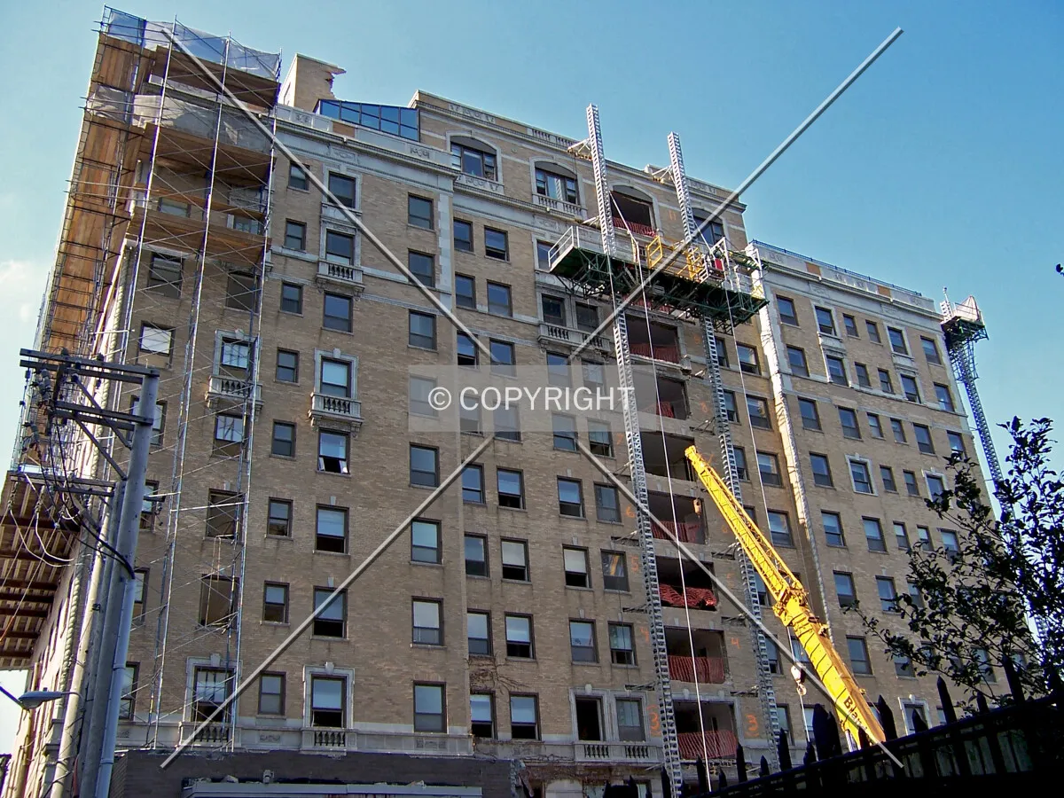 Look up the east facade from the southeast during the begining stages of demolition
