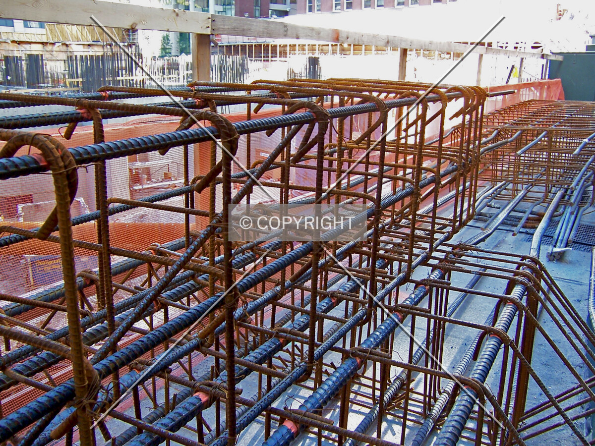 Rebar cages for vertical collumns stacked along Rush Street