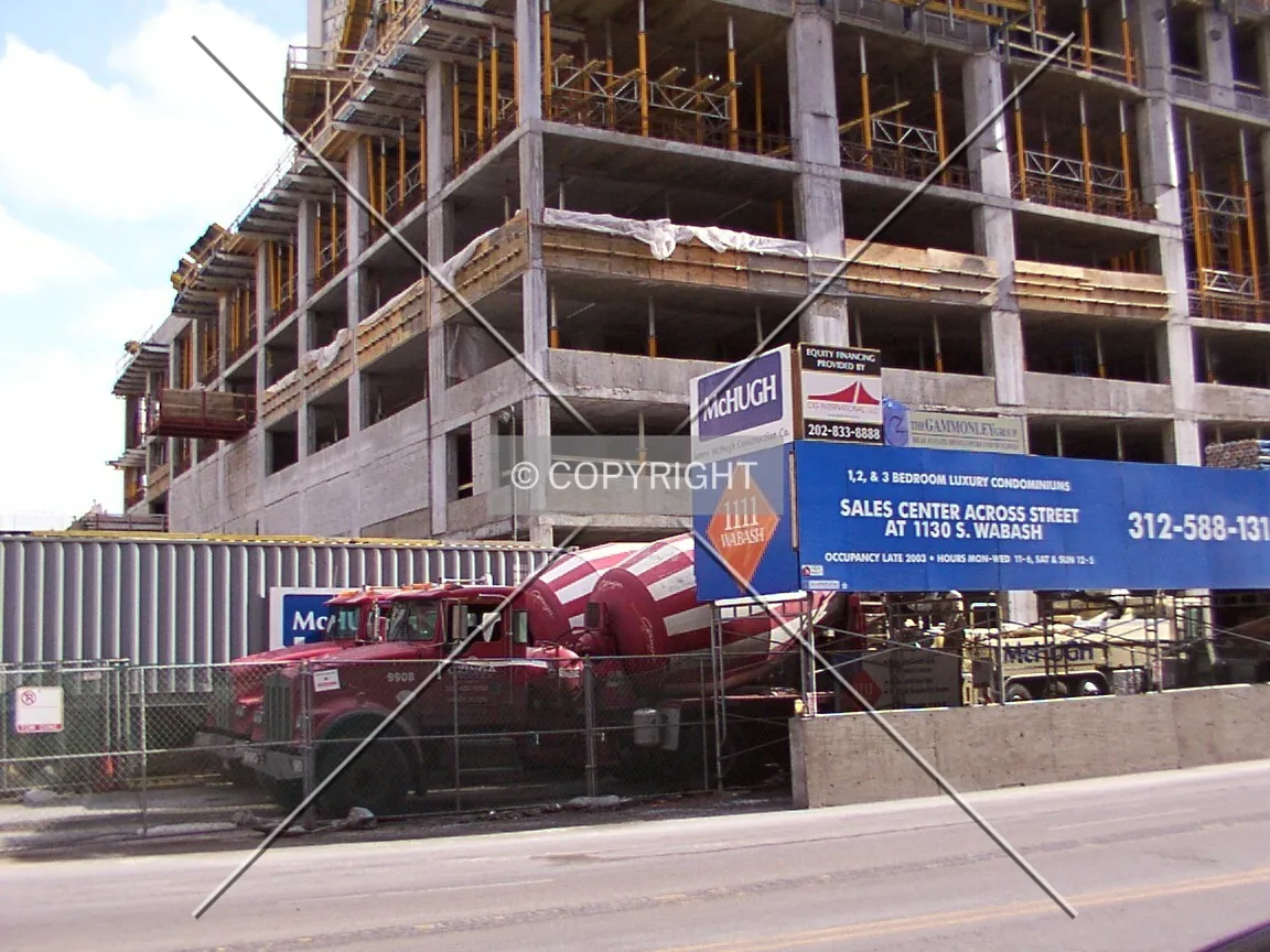 Ozinga concrete mixers at the northwest corner