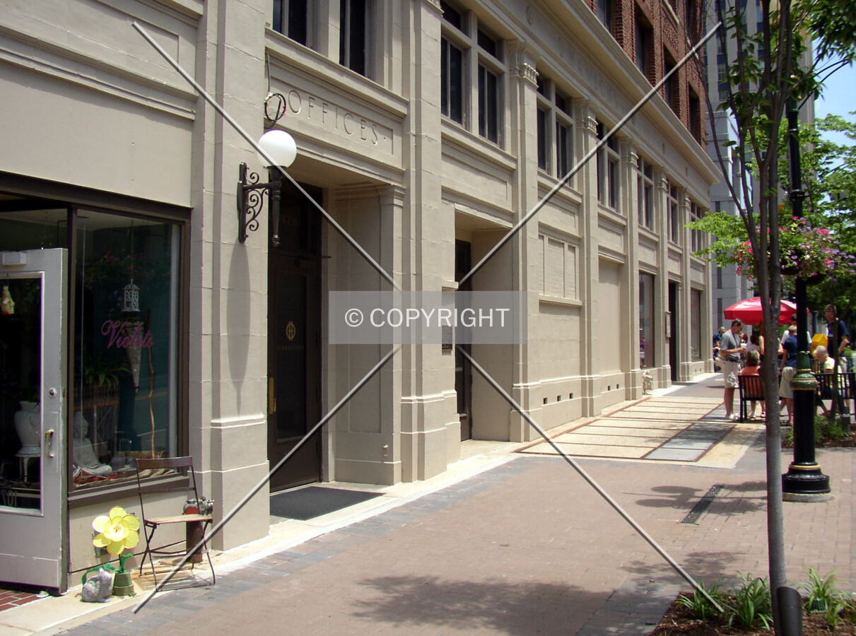 Looking east along the building’s base from West 4th Street